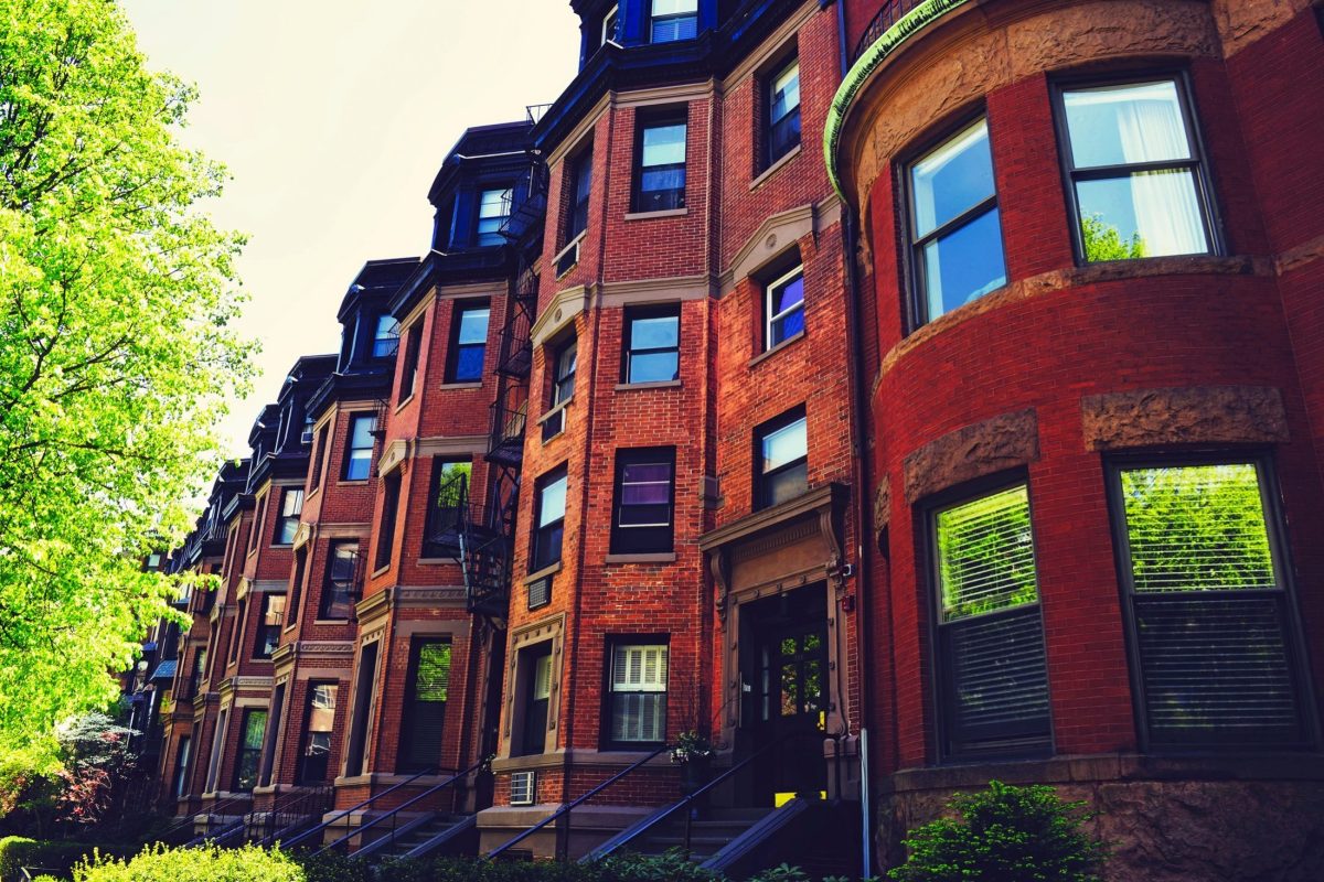 Housing lines the street of a classic Boston neighborhood. Photo via Pixabay