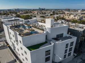 Picture of a high-rise white building with garden on top in Los Angeles. Photo credit RMA Photography Inc.